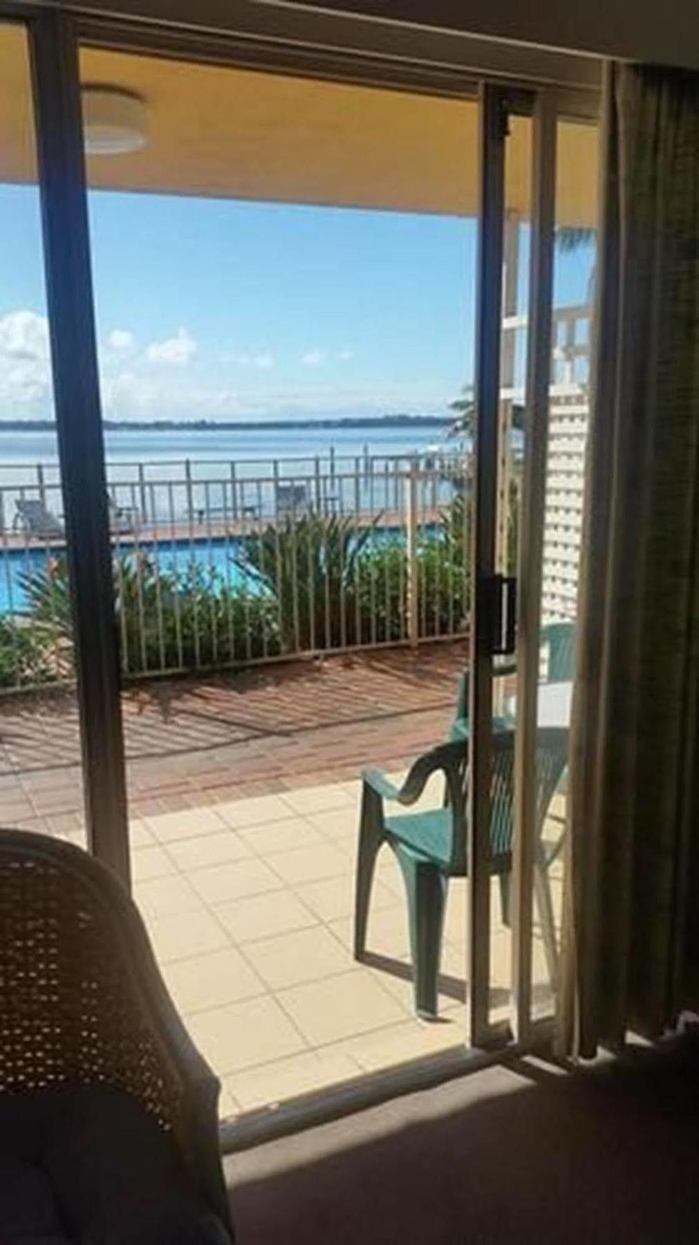 The Beachcomber Hotel & Resort, Ascend Hotel Collection Toukley Exterior foto View of the pool from a guest room
